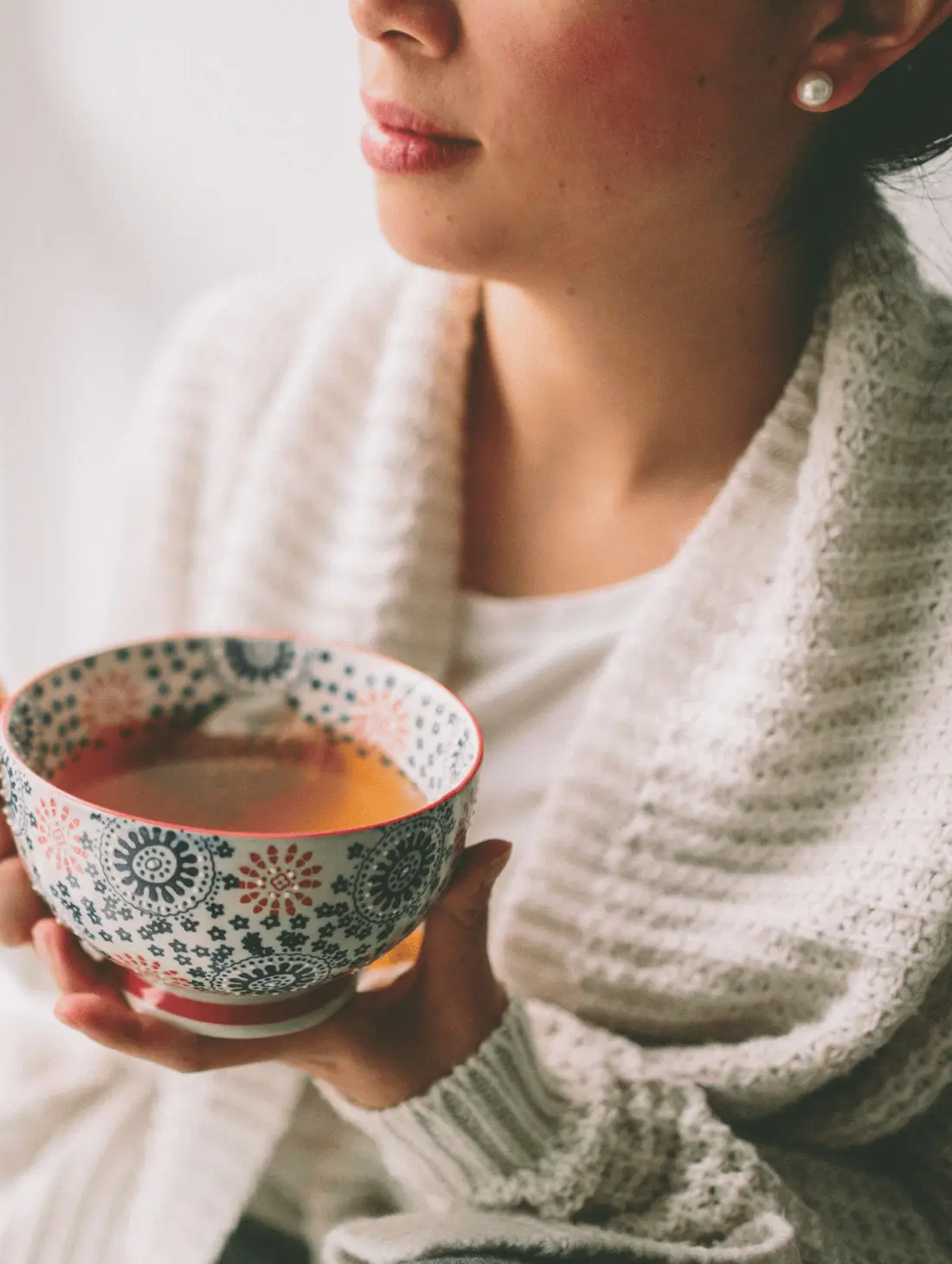 Coach mentoring a student in a sunlit room